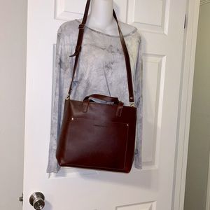 Portland leather Genuine leather medium Crossbody handbag. The color is Cognac